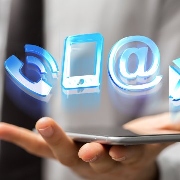 efax, online fax service, cost, pricing, hand holding smartphone, call, phone, @, email blue symbols